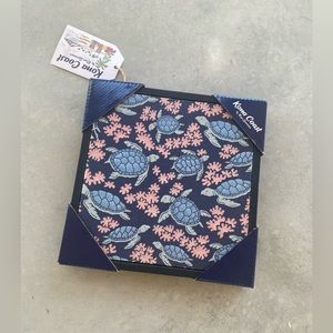 Kona Coast canvas art print featuring sea turtles in navy’s and pinks